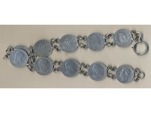 Coins, Nordic countries. 2 kronor. 245 g. Ten coins made as a belt, 2 kronor from Sweden, Norway and Denmark, 1875–1917, mixed quality.  .