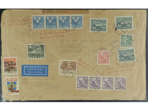 Sweden. Facit 233b, 253, 273, 276, 293, 328 on cover, 5+4x10+15+20+40+4x90 öre + 3x5 kr on air mail cover sent from LIDKÖPING 16.6.41, BY AIR OVER THE ATLANTIC AND FROM NEW YORK, to USA. The cover and stamps with some imperfections, nevertheless a nice cover with unusually high franking. SEK 2000